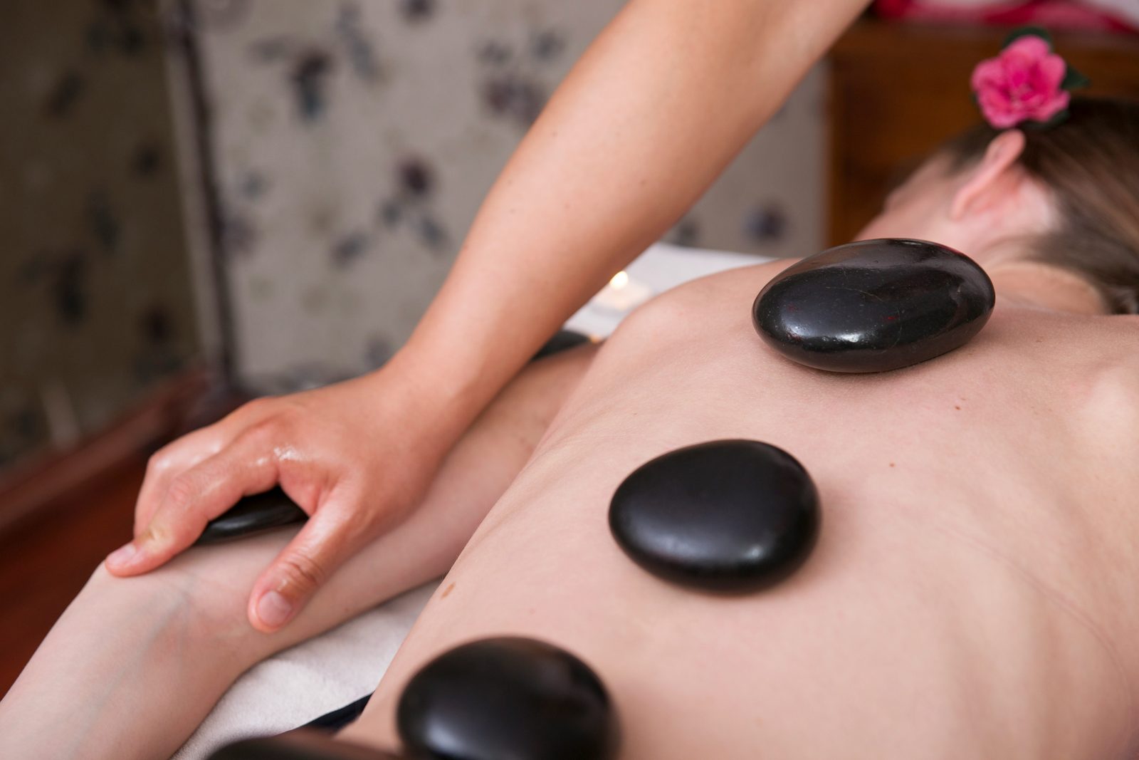 Hot stone therapy in progress